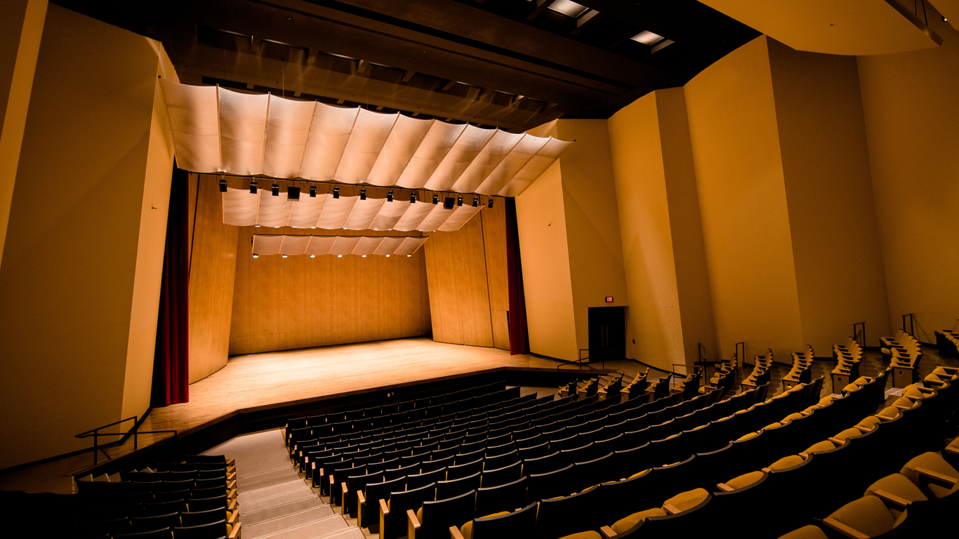 A back of the house view of the seating and stage in the Recital Hall at the Singletary Center.