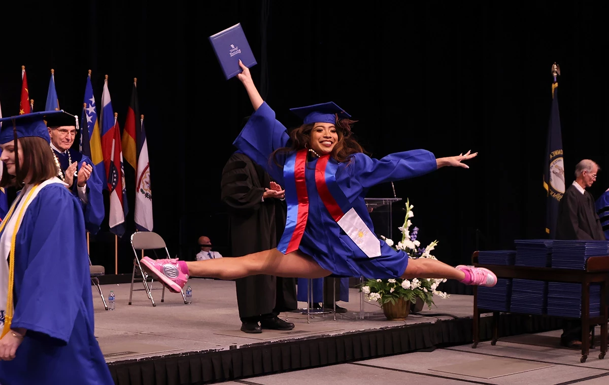 dancer leaping at graduation