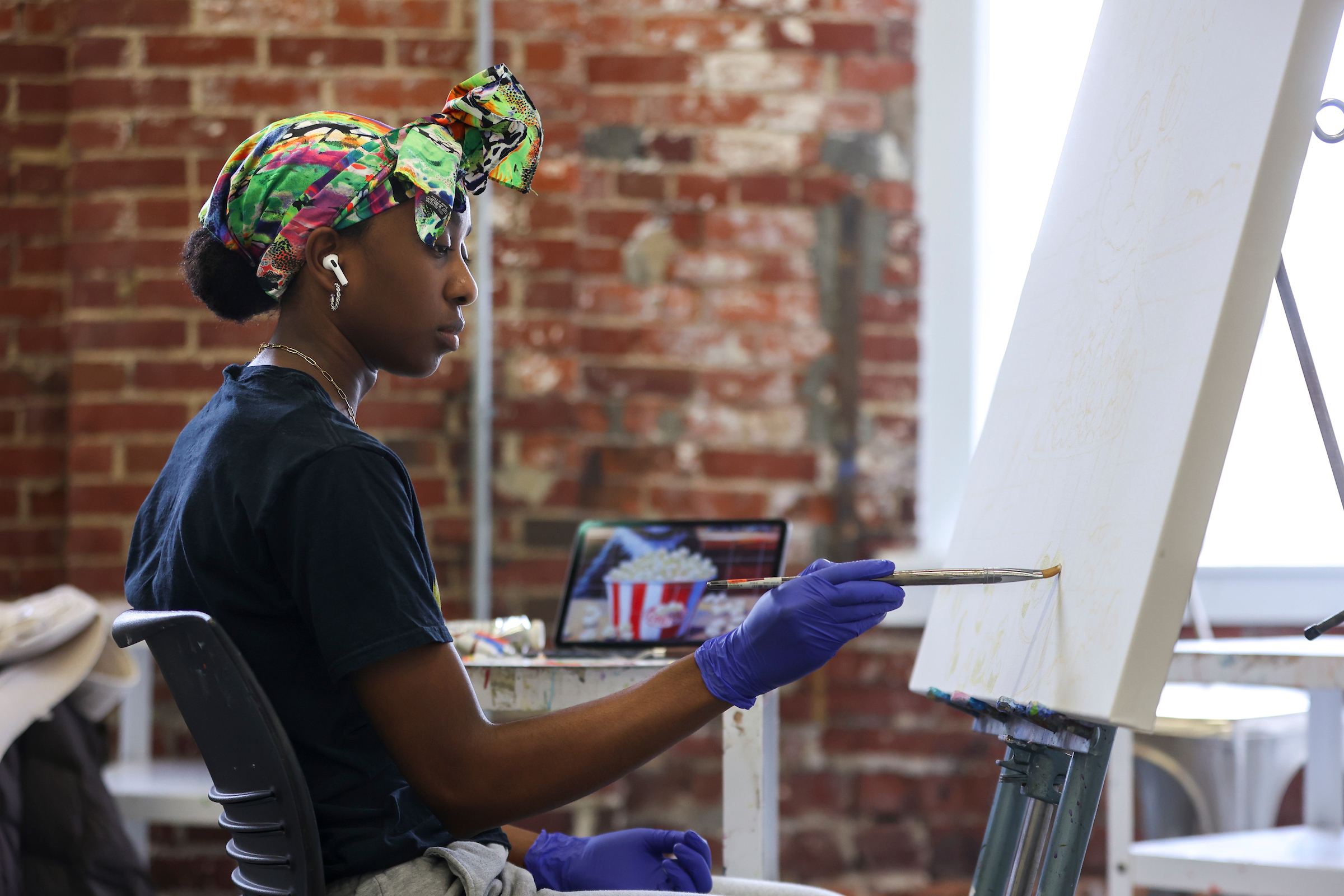 student at easel