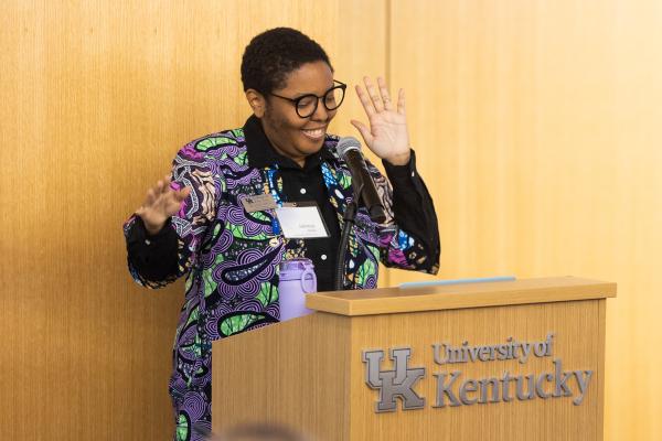 jaleesa wells speaking at podium