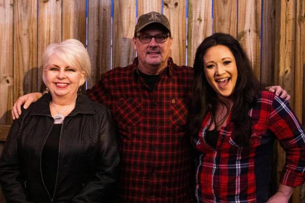 Image of Renee Cobb, her husband Warren Cobb, and co-host Rachel Crowe.