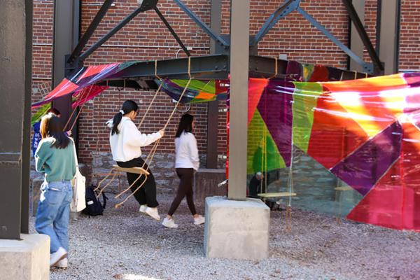 Fiber installation outside with person swinging
