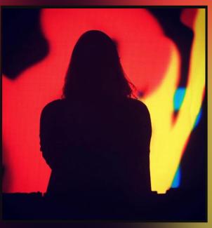 silhouette of person on red abstract background