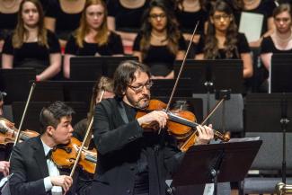 people playing violins