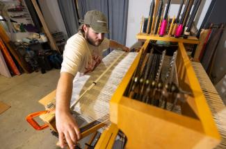 Mitchell Burleson on loom