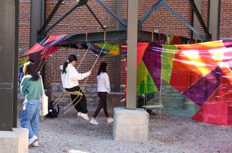 Fiber installation outside with person swinging