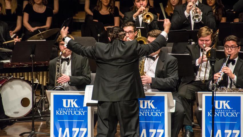 jazz students performing on stage with conductor in front