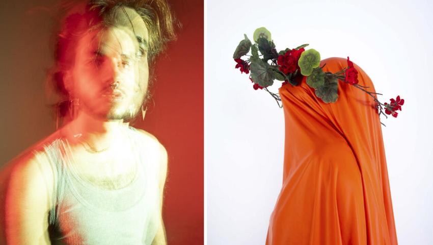 person looking at camera, person wearing orange fabric