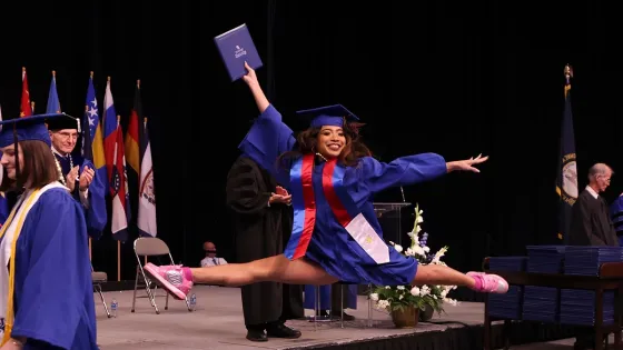 dancer leaping at graduation