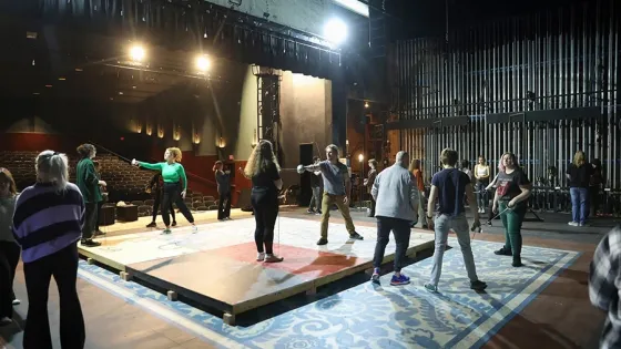 fencers on stage