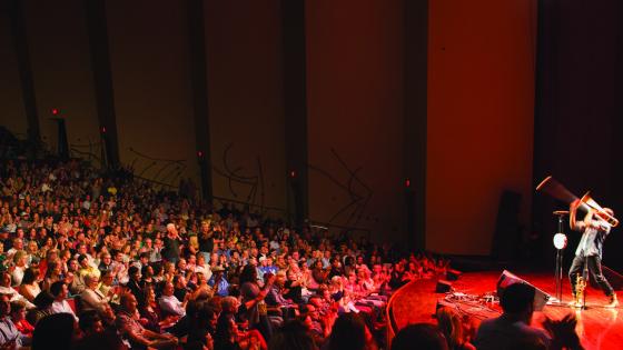 Trombone Shorty playing passionately in front of full house at the Singletary Center Concert Hall.