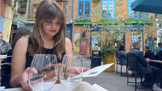 image of Meg Klosterman at a cafe in Paris
