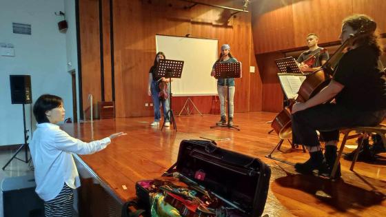 Tze-Ying Wu directs the Ionian University String Ensemble in Corfu, Greece.