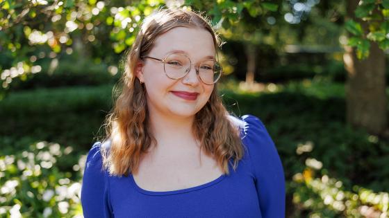 Elizabeth Watson in front of trees