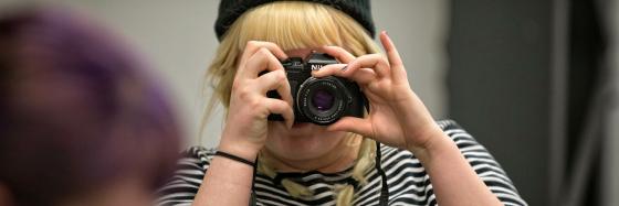 Person with camera pointed at camera