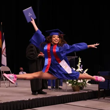 dancer leaping at graduation