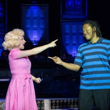 two singers on stage