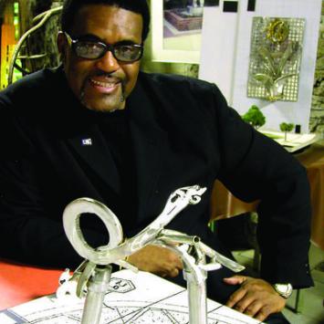 Garry Bibbs with art model in front