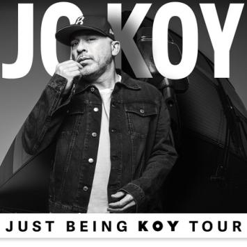 Person in front of JO KOY in black and white