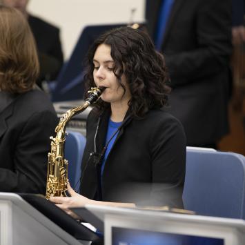 student playing saxophone