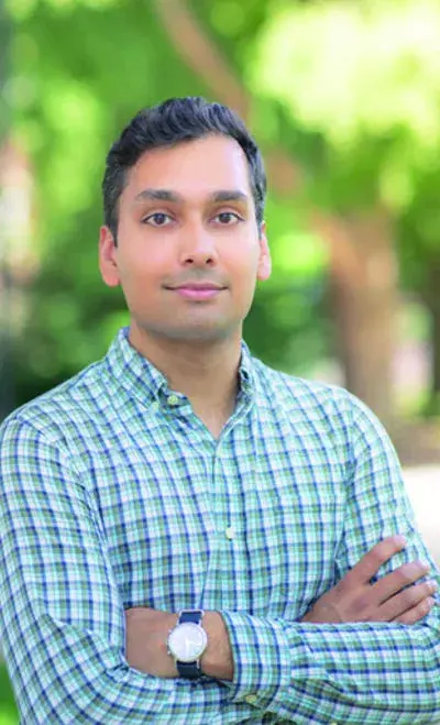 Shaan Azeem with tree in background