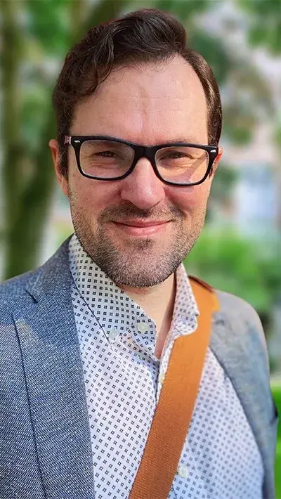 Headshot of Jason Rosenholtz-Witt